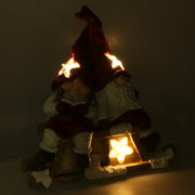 Santa Claus führte Harz mit Mädchen RosSocm40x26H15